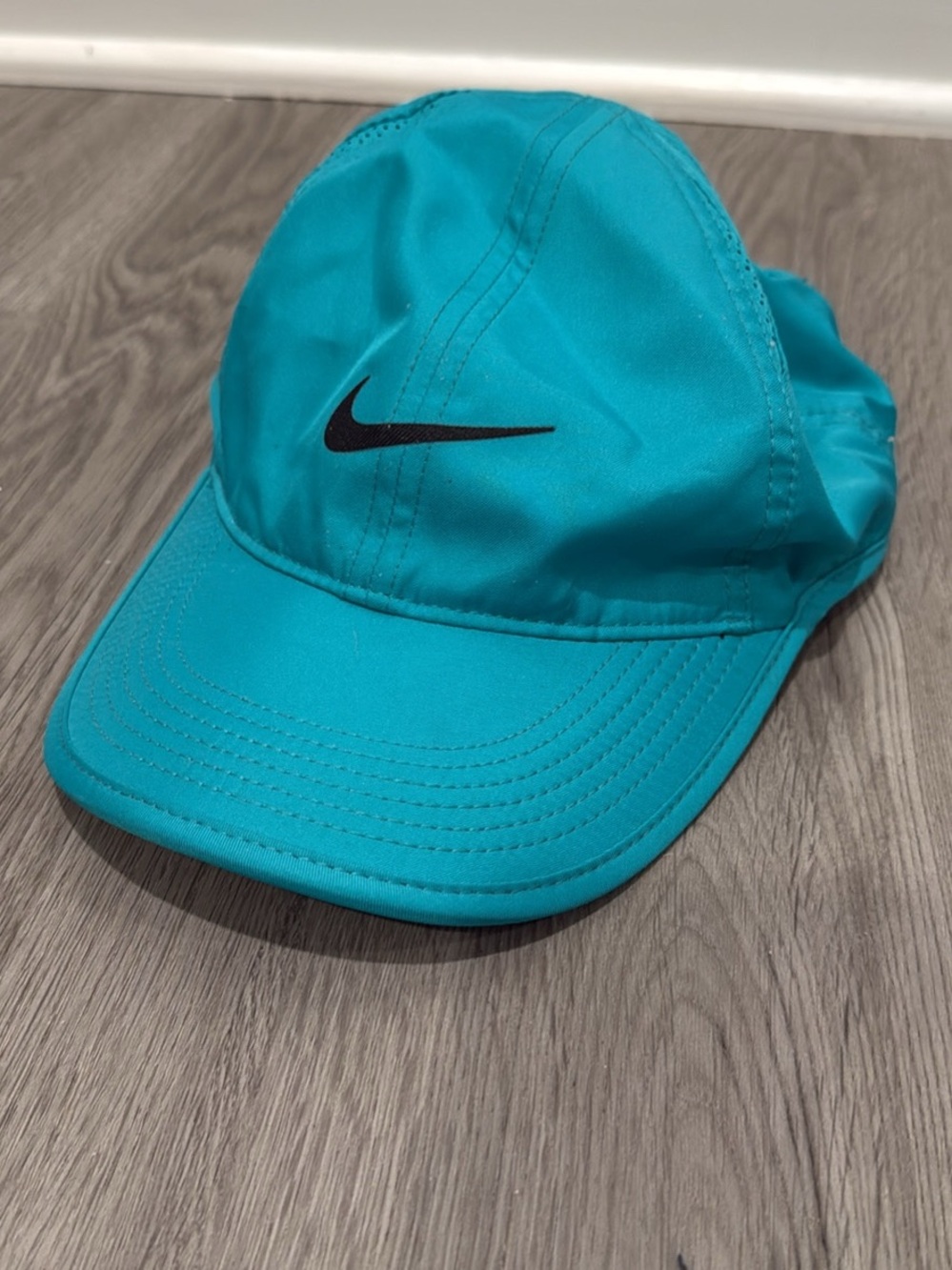 Nike lightweight Turquoise Performance Cap with Black Swoosh Dri fit